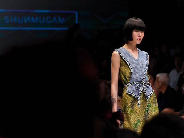 Singapore label ONG SHUNMUGAM showcased its Fall Winter 2014 collection at Audi Fashion Festival, inspired by the architectural heritage of the country