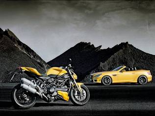 The SLK 55 AMG and Ducati 848 in "Streetfighter Yellow" on display at the Bologna Car Show