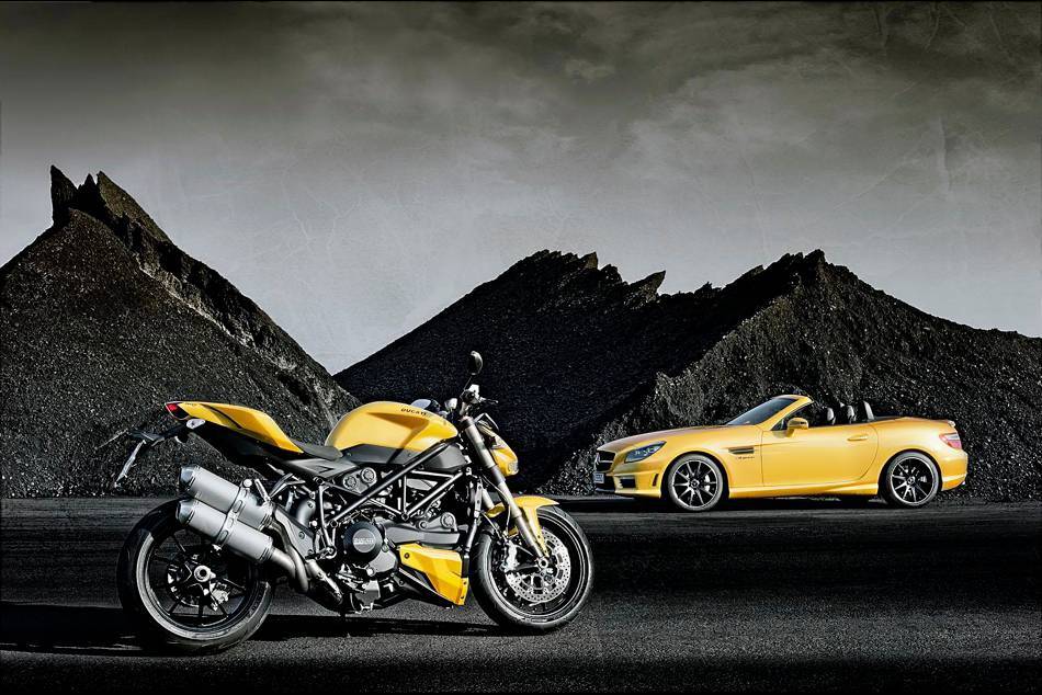 The SLK 55 AMG and Ducati 848 in "Streetfighter Yellow" on display at the Bologna Car Show The SLK 55 AMG and Ducati 848 in "Streetfighter Yellow" on display at the Bologna Car Show