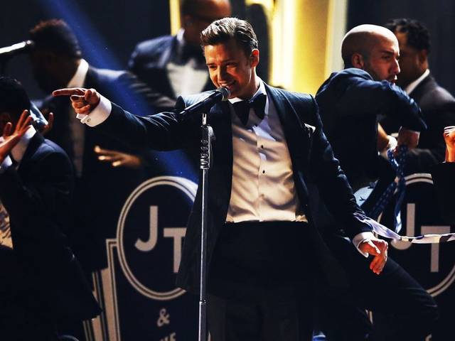 Justin Timberlake performs at the 2013 Grammy Awards, a return to the spotlight with his first televised performance since he released Suit & Tie in January, his first new song in five years
