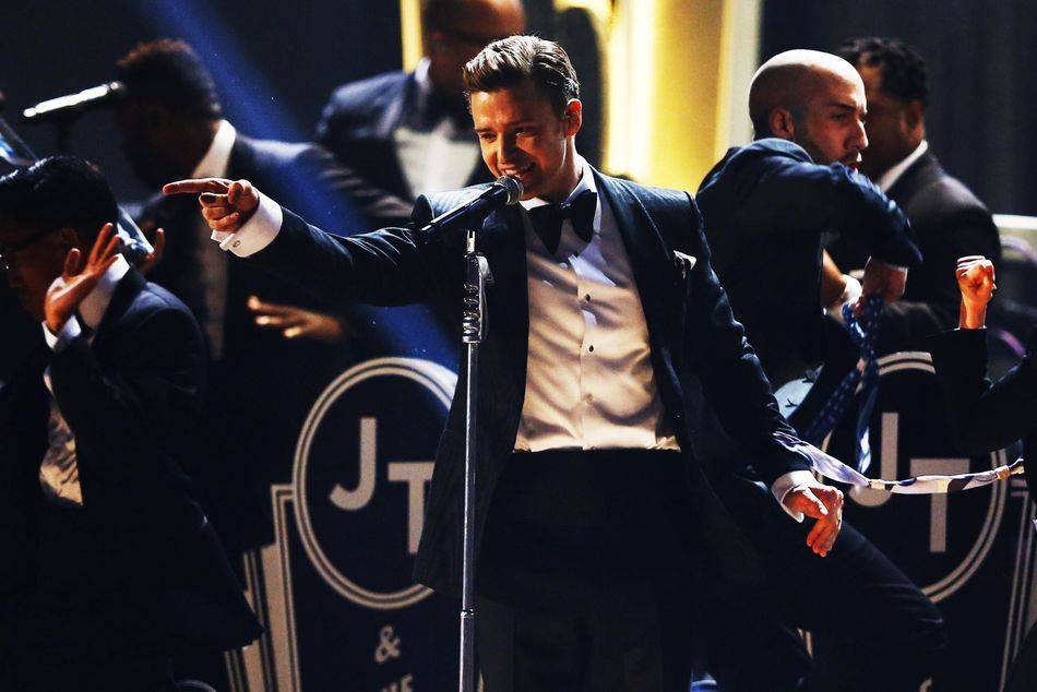 Justin Timberlake performs at the 2013 Grammy Awards, a return to the spotlight with his first televised performance since he released Suit & Tie in January, his first new song in five years