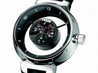 The hands hover on an astounding system of transparent sapphire discs