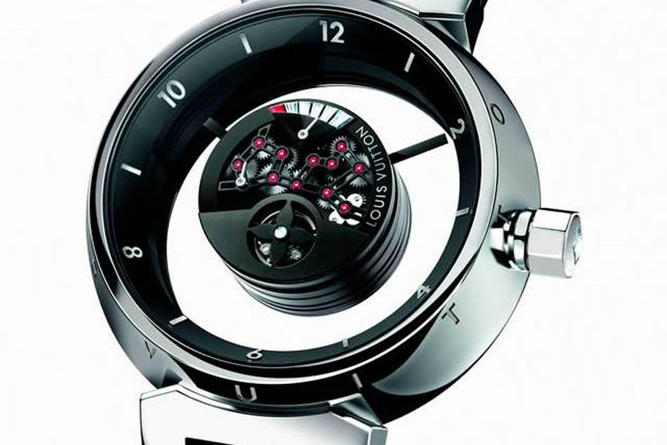 The hands hover on an astounding system of transparent sapphire discs