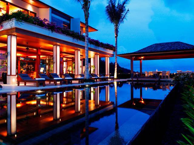 Nestled in a lush hilltop set above secluded Kamala Beach