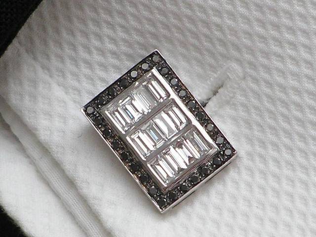 Cuff link design by <a href="http://www.sachaorloff.com">Sacha Orloff Ltd</a>