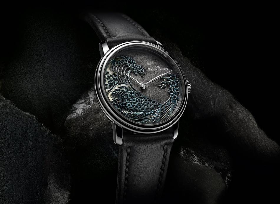 The timepiece features the use of Mexican silver obsidian and the Japanese rokushō patina technique