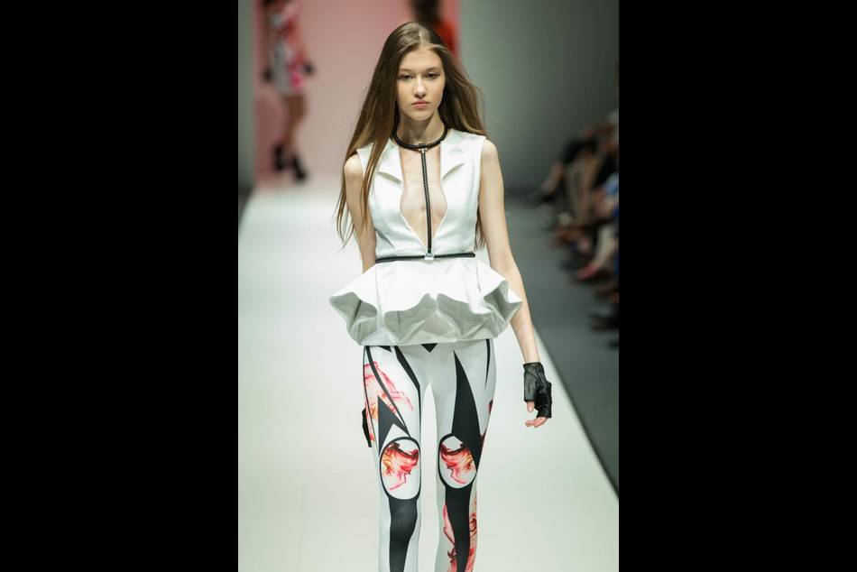 LION EARL, a womenswear label founded in Singapore, draws out the futuristic machinations of TRON in its genre-defying fashion designs showcased during Audi Fashion Festival