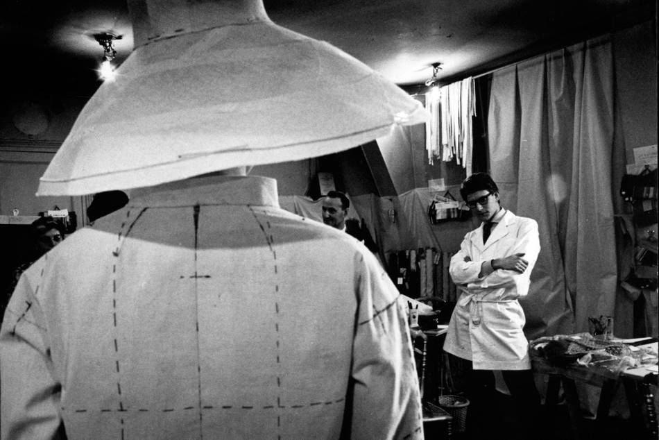 Enter the world of Yves Saint Laurent through original pictures capturing his creative work, anxiety and happiness.